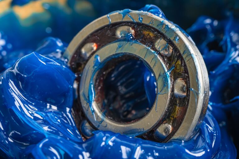 ball bearings being maintained with premium quality blue grease