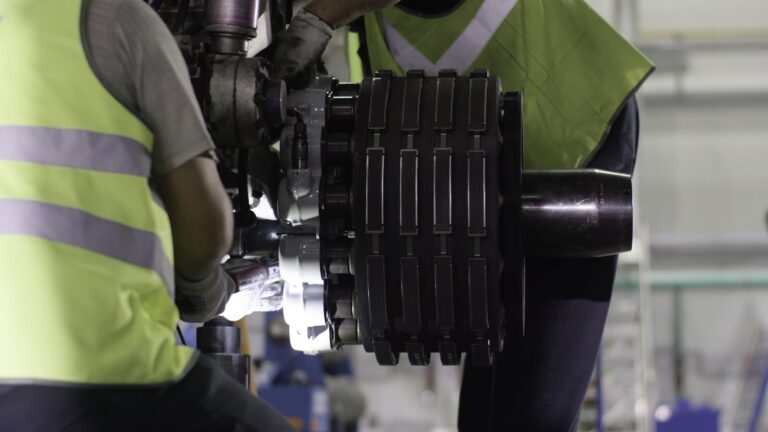 maintenance technicians maintaining a valve